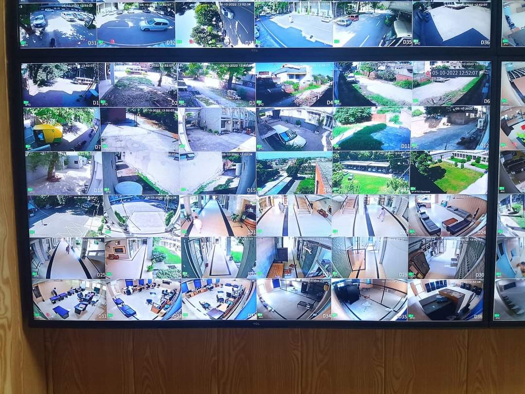 Multi-camera CCTV monitoring wall installed by AerixSys showing dozens of live camera feeds