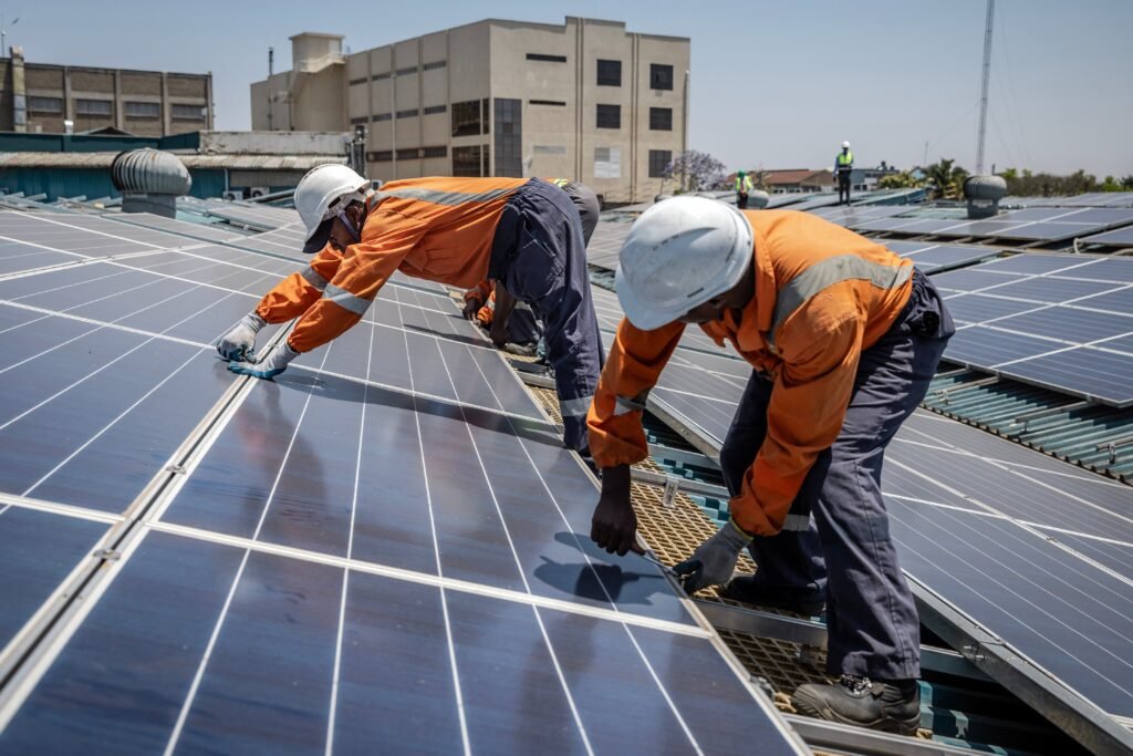 AerixSys technicians installing commercial rooftop solar panels